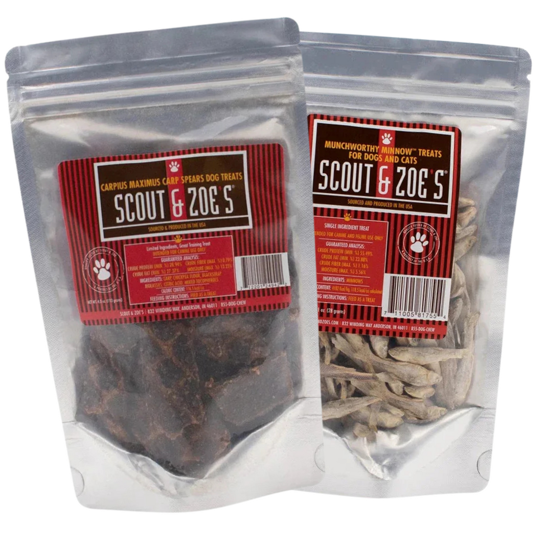 Two packages of dog treats labeled 'Scout & Zoe's', one with Munchworthy Minnows and another with Carp Spears, both transparent with red and white branding.
